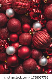 Close Up Of A Variety Of Red And White Christmas Ball Ornaments.