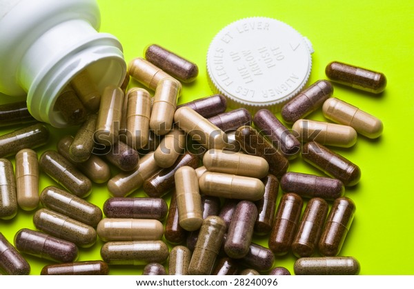 Of Various Vitamin Capsules Spilled From A Bottle Various Vitamin Capsules Spilled Bottle Stock Photo