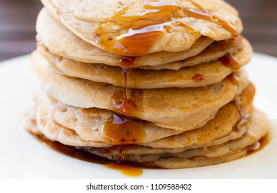 Close Up Of Vegan Buckwheat Pancake Tower With Maple Syrup