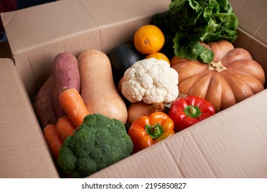 Close Up Of Vegetable Box That Has Just Been Delivered With Seasonal Fresh Veg