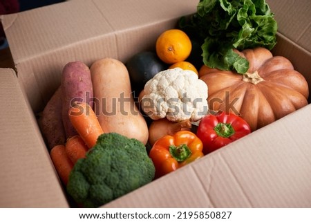 Close up of vegetable box that has just been delivered with seasonal fresh veg