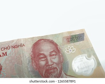 Close up a Vietnamese currency 200.000 dong banknote over white background - Shutterstock ID 1265587891