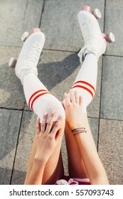 Close Up View From Above Of Woman's Legs In A Vintage Roller Skates, Golfs. Outdoor.