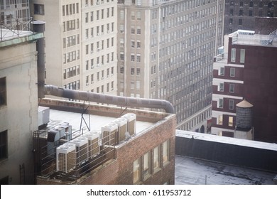 Close Up View Of AC Air Cooling Units On Rooftop Of Building In New York City.