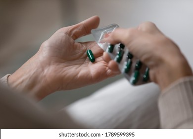 Close Up View Aged Female Hands Holding Pharmaceutical Blister Pack With Oral Capsules, Vitamin Supplements For Elderly People, Senile Disorders Prevention Meds, Health Care Of Senior Citizens Concept