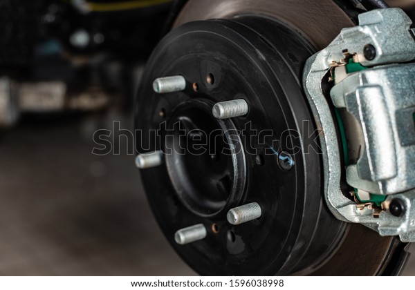 close\
up view of assembled disc brakes with brake\
caliper