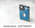 Close up view of back side computer hard drive 2.5" isolated on white background.