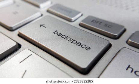Close up view of backspace key button on computer laptop keyboard