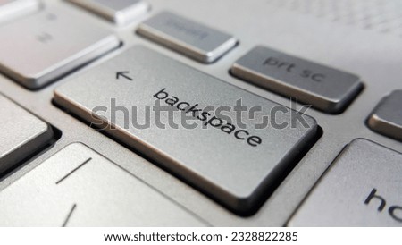 Close up view of backspace key button on computer laptop keyboard