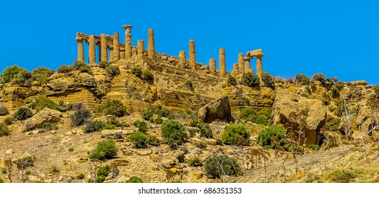 A Close Up View From The Base Of Ridge Looking Up At The Temple Of Juno In The Ancient Sicilian City Of Agrigento In Summer