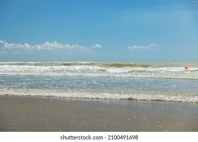 
Close Up View From A Beach On A Sea Landscape At Daytime During Summer Season Under A Clear Sky, Beautiful Rough Water And View On The Horizon, Travel And Summer Holidays Locations, Italy 