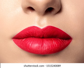 Close Up View Of Beautiful Woman Lips With Red Lipstick. Fashion Make Up. Cosmetology, Drugstore Or Fashion Makeup Concept. Studio Shot