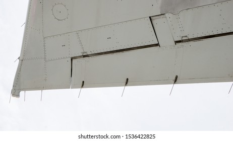 Close Up View From Below Of Aircraft's Static Discharge, Near Wingtip To Protect Aircraft From Lightning.