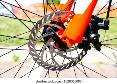 Close up view of bicycle detail. Bicycle disk brake installed in front wheel