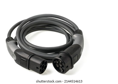 Close up view of black electric vehicle charging cable for outdoor use with 3-phase 20A 480V plug isolated on white background. Sweden.