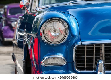 Close up view of blue classic American muscle car.