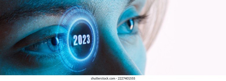 Close up view of blue eye with futuristic holographic interface to display data. Portrait of beautiful young woman, half of face. Augmented reality, future technology, 2023 concept. - Shutterstock ID 2227401555