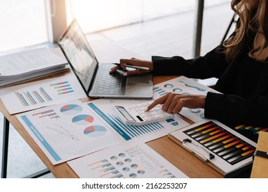 Close up view of bookkeeper or financial inspector hands making report, calculating or checking balance. Home finances, investment, economy, saving money or insurance concept - Shutterstock ID 2162253207
