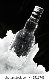 Close Up View Of The Bottle In Ice