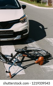 Close Up View Of Broken Bicycle And Car On Road, Car Accident Concept