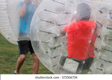 Close Up View Of Bubble Football Balls Game.