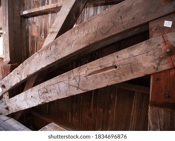 Close Up View Of The Burr Arch Truss Of A Restored Old 1844 Covered Bridge On A Sunny Day