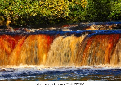 Close up view of cascading water at Wain Wath force, Swaledale, Yorkshire Dales National Park, England, UK.