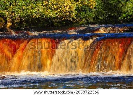 Close up view of cascading water at Wain Wath force, Swaledale, Yorkshire Dales National Park, England, UK.