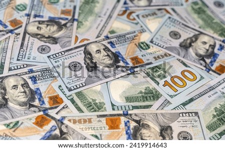 Close up view of cash money, 100 one hundred US dollar bills, 50 US dollar bills, 20  US dollar bills, lots of cash. 