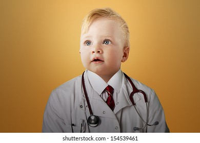 Close Up View Of Caucasian Baby Dressed As A Doctor