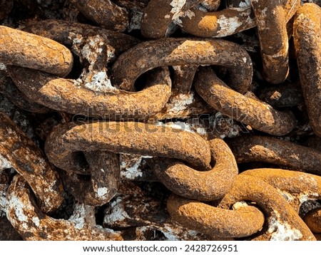 close up view of chains rusted due to seawater with salt