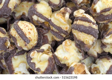 Close View Of Chocolate Fudge Drizzled Popcorn.