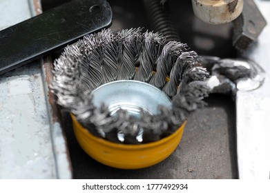 Close Up View Of A Cleaning Wire Brush On A Table