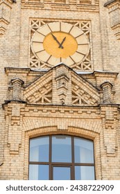 It's a close up view of clock on main building of National Technical University of Ukraine. Its photo of Igor Sikorsky Kyiv Polytechnic Institute. 