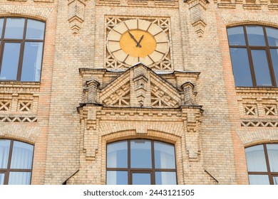 It's close up view of clock on main building of the National Technical University of Ukraine. Its photo of Igor Sikorsky Kyiv Polytechnic Institute. 