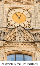 It's close up view of clock on main building of National Technical University of Ukraine. Its photo of Igor Sikorsky Kyiv Polytechnic Institute. 