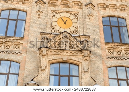 It's close up view of clock on main building of National Technical University of Ukraine. Its photo of the Igor Sikorsky Kyiv Polytechnic Institute. 