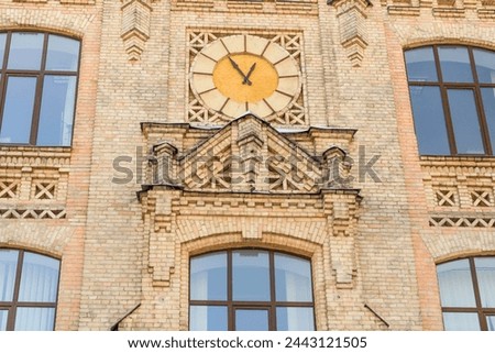 It's close up view of clock on main building of the National Technical University of Ukraine. Its photo of Igor Sikorsky Kyiv Polytechnic Institute. 