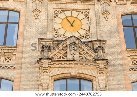 It's close up view of clock on the main building of National Technical University of Ukraine. Its photo of Igor Sikorsky Kyiv Polytechnic Institute. 
