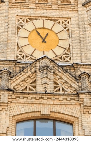 It's close up view of clock on main building of National Technical University of Ukraine. Its photo of Igor Sikorsky Kyiv Polytechnic Institute. 