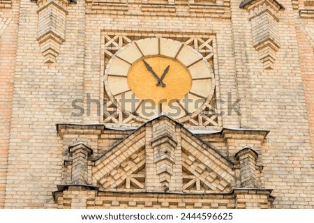 It's close up view of the clock on main building of National Technical University of Ukraine. Its photo of Igor Sikorsky Kyiv Polytechnic Institute. 