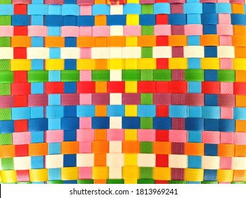 Close Up View Of Colorful Plastic Woven Basket Texture Background