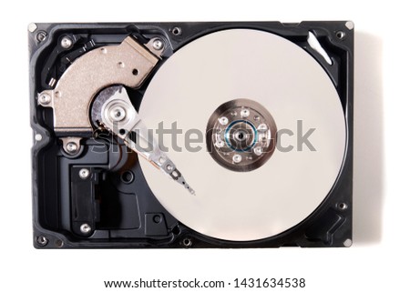 Close up view of a computer hard drive isolated on a white background.