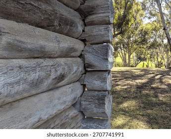 A close up view of the corner construction on the historic log jail in Carisbrook, Victoria, Australia.