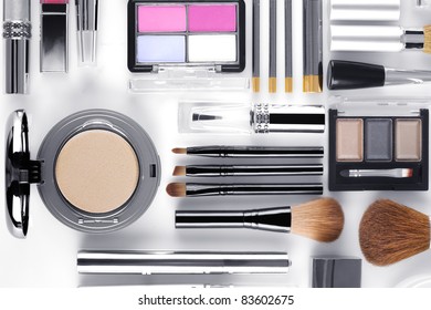 Close up view of cosmetic theme objects on white back