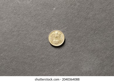 Close View Of Counterfeit Coin