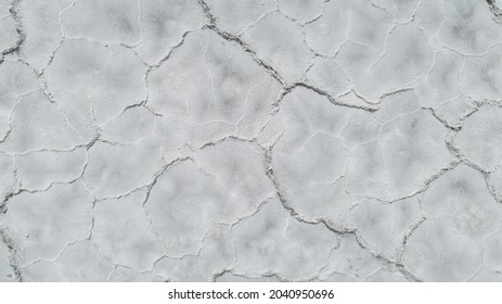 close up view of cracks in the ground at the bonneville salt flat - Powered by Shutterstock