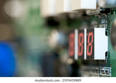 Close up view of digital counter on Printed circuit board. - Powered by Shutterstock - Get 15% off with code: PIKWIZARD15