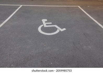 Close Up View Of Disabled Parking Spot Asphalt Marking. Sweden. 