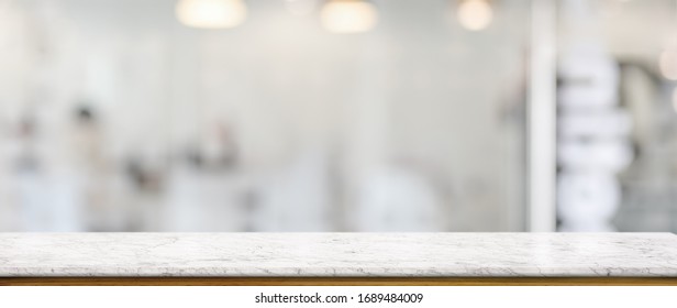 Close Up View Of Empty Marble Counter In Glass Partition 